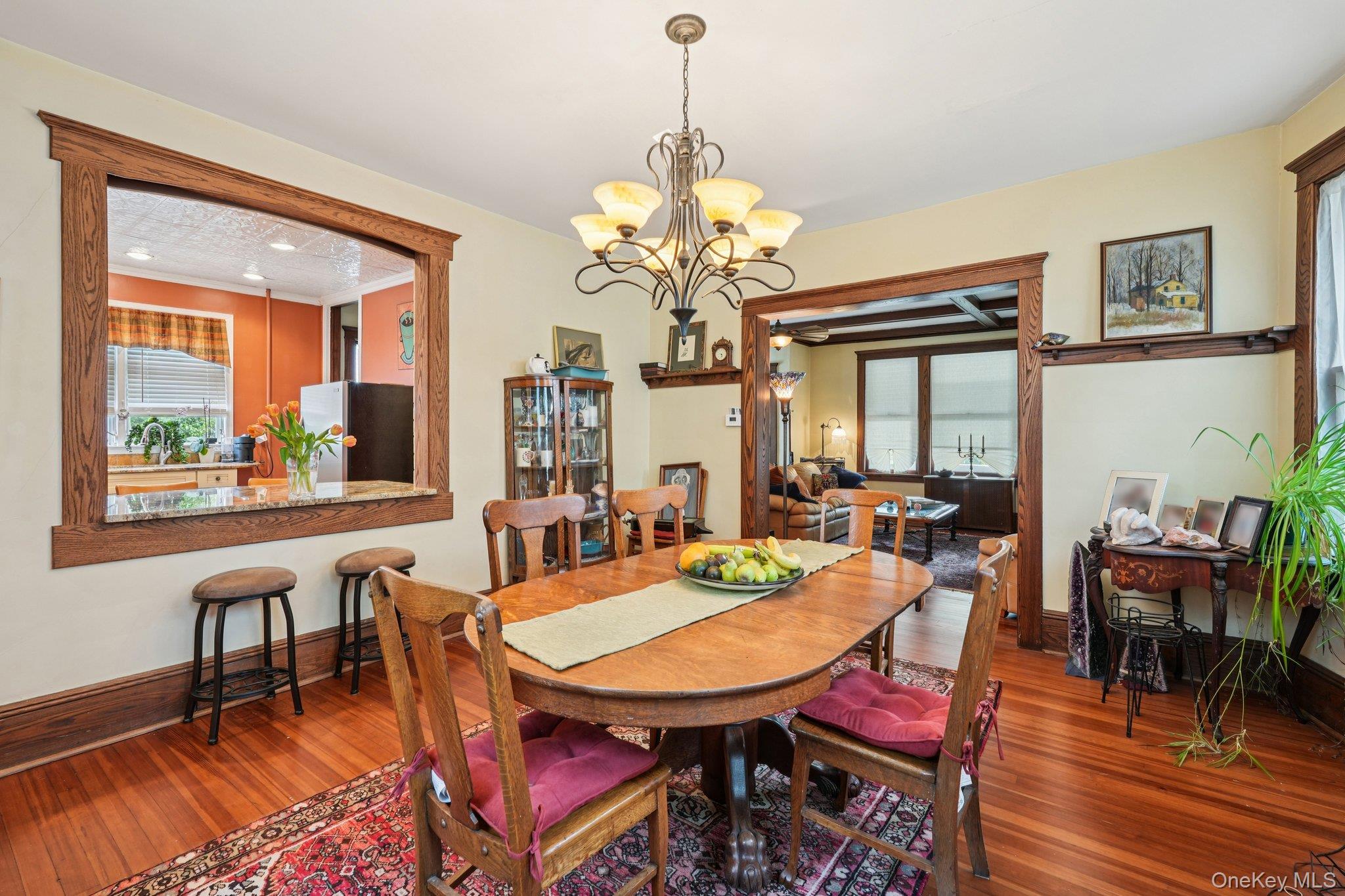 74 East Maple Avenue Suffern, NY 10901 - Photo 11 of 50 Dining room with hardwood / wood-style floors and a chandelier
