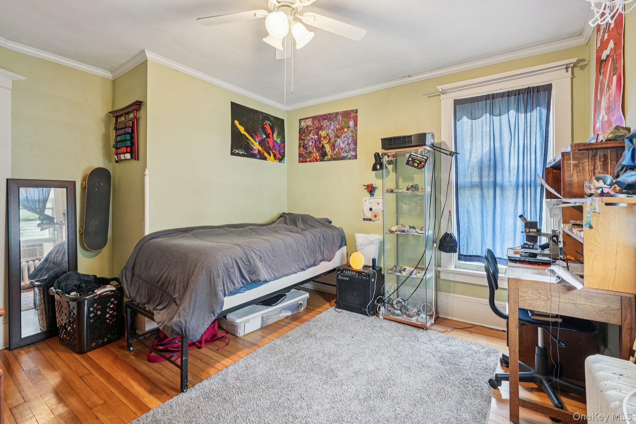 74 East Maple Avenue Suffern, NY 10901 - Photo 33 of 50 Bedroom featuring crown molding, hardwood / wood-style flooring, an office area, and ceiling fan