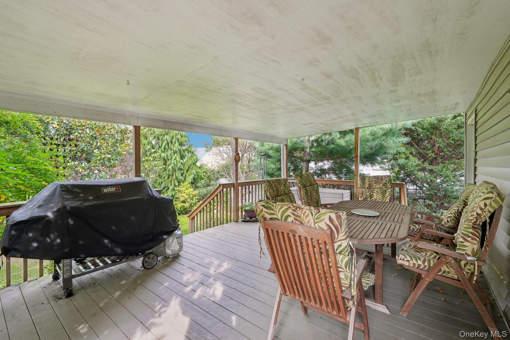 74 East Maple Avenue Suffern, NY 10901 - Photo 38 of 50 Wooden deck featuring a grill and outdoor dining area