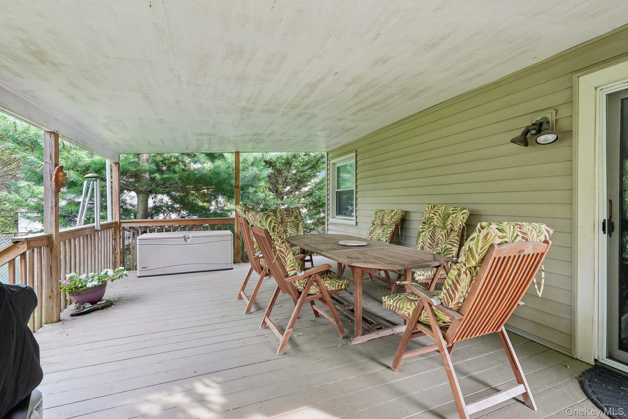 74 East Maple Avenue Suffern, NY 10901 - Photo 39 of 50 Wooden deck featuring outdoor dining area