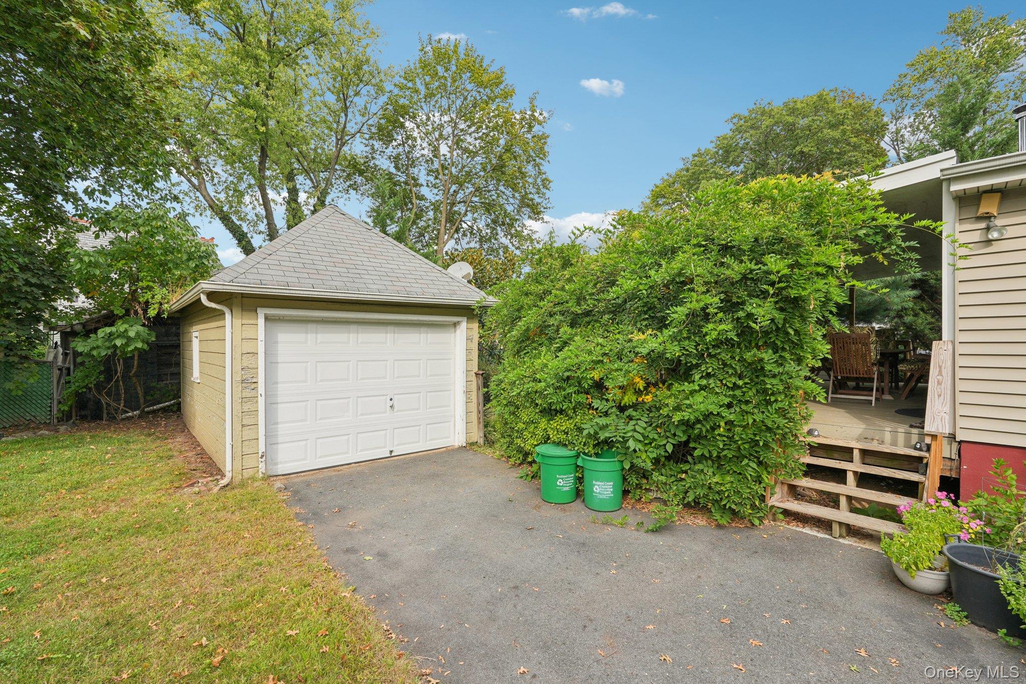 74 East Maple Avenue Suffern, NY 10901 - Photo 42 of 50 Detached garage with asphalt driveway