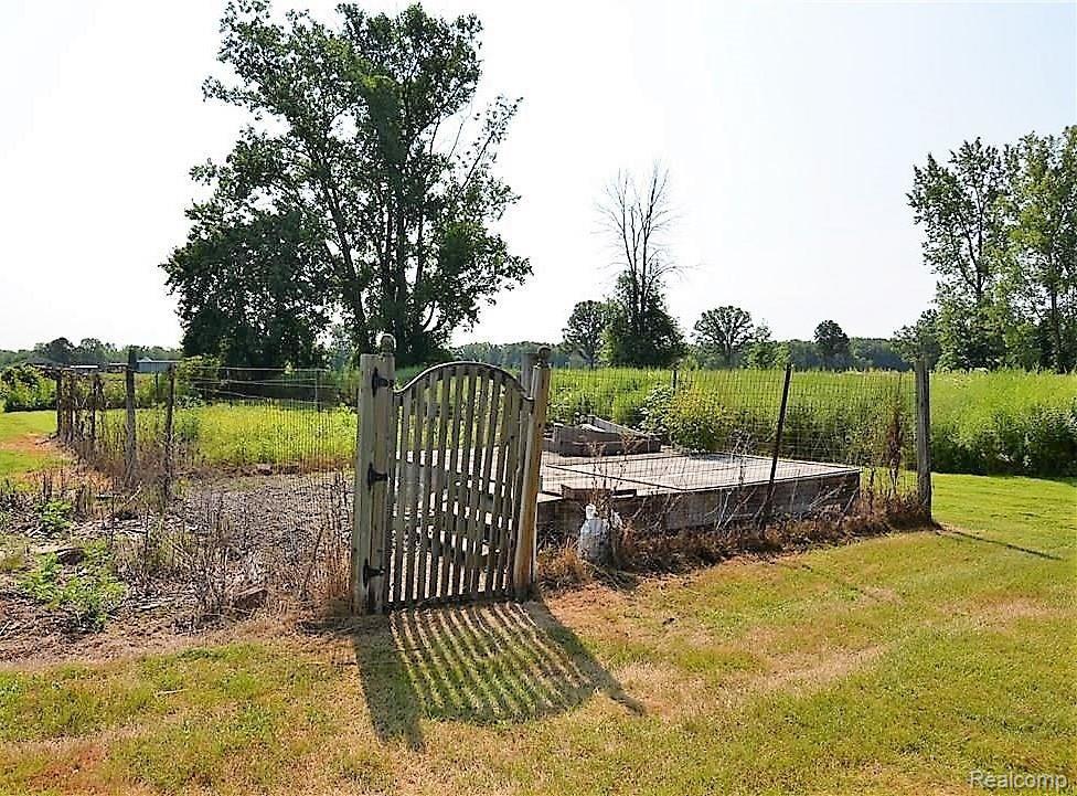 11315 Wilson Road Montrose, MI 48457 - Photo 24 of 30 FENCED GARDEN/RAISED BED AREA