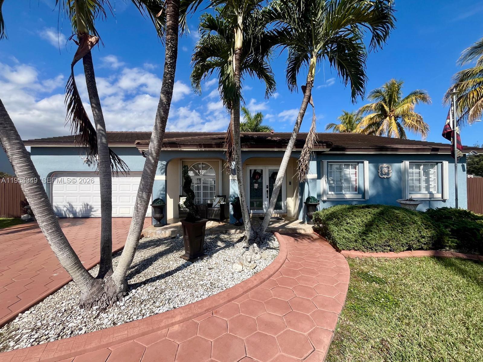a view of a backyard with a small cabin