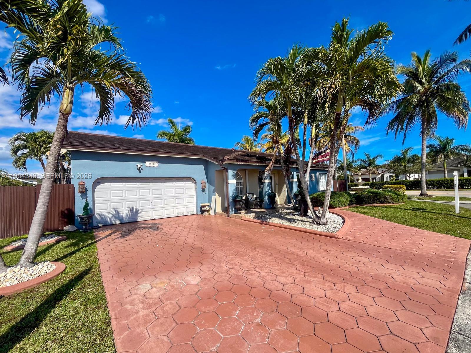 15201 Southwest 177th Terrace Miami, FL 33187 - Photo 8 of 49 a view of house with outdoor space and shower