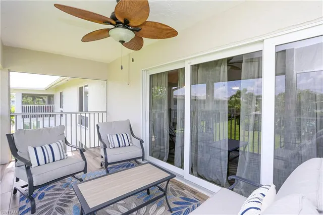 a bathroom with a granite countertop sink toilet a mirror a bathtub and shower