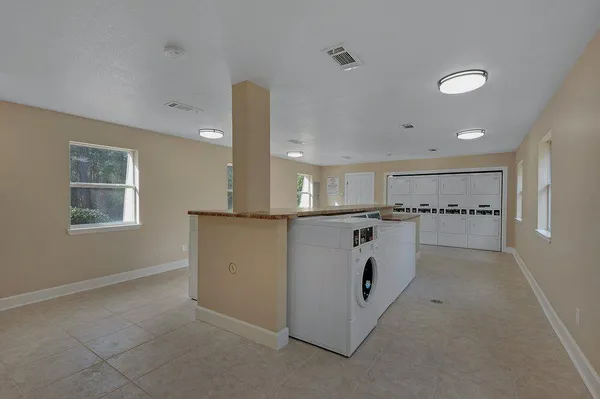 a view of kitchen and windows