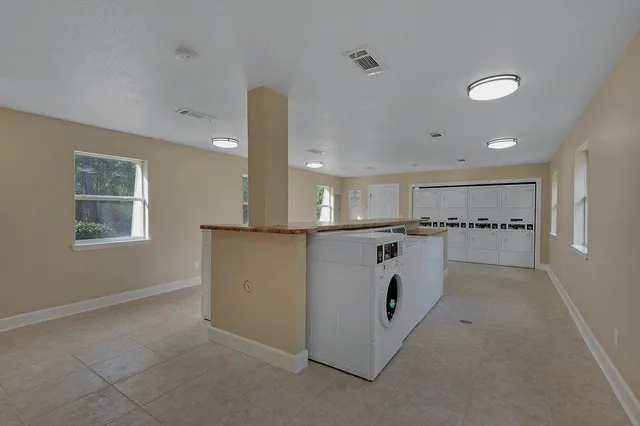 a view of kitchen and windows