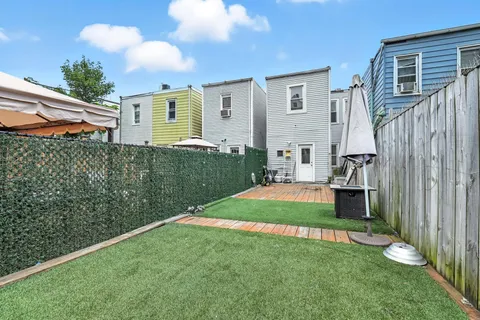 a house view with a backyard space