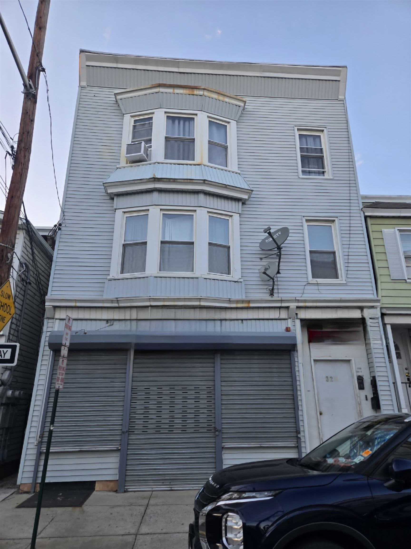 328 Cross Street, Unit 2 Harrison, NJ 07029 - Photo 3 of 3 a view of building with a door