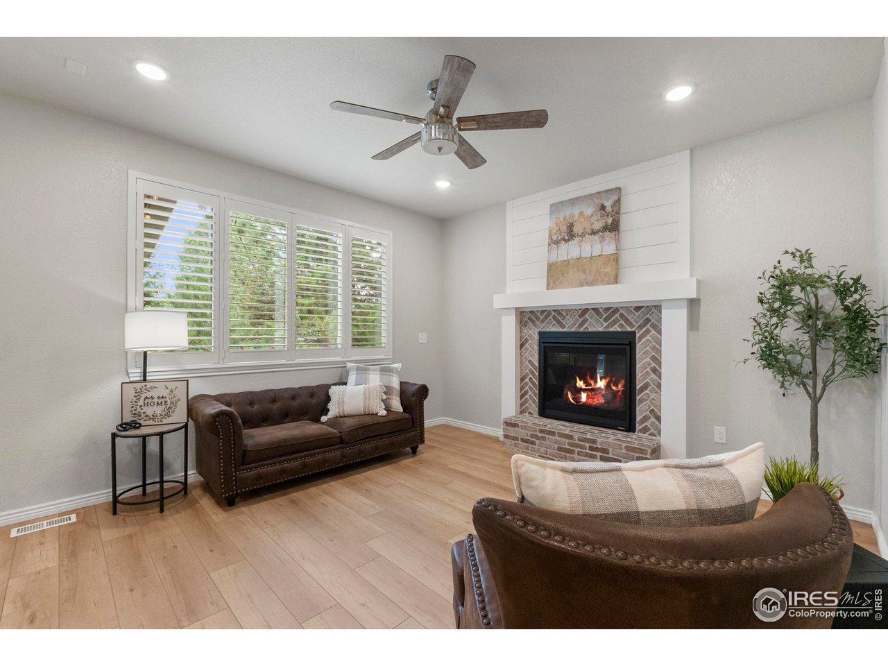 5409 Rabbit Creek Road Fort Collins, CO 80528 - Photo 4 of 40 Cozy brick and wood fireplace