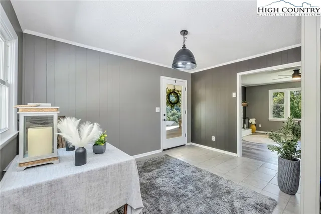 a room with couch and chandelier