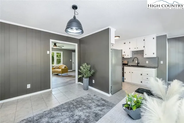 a room with furniture and a window