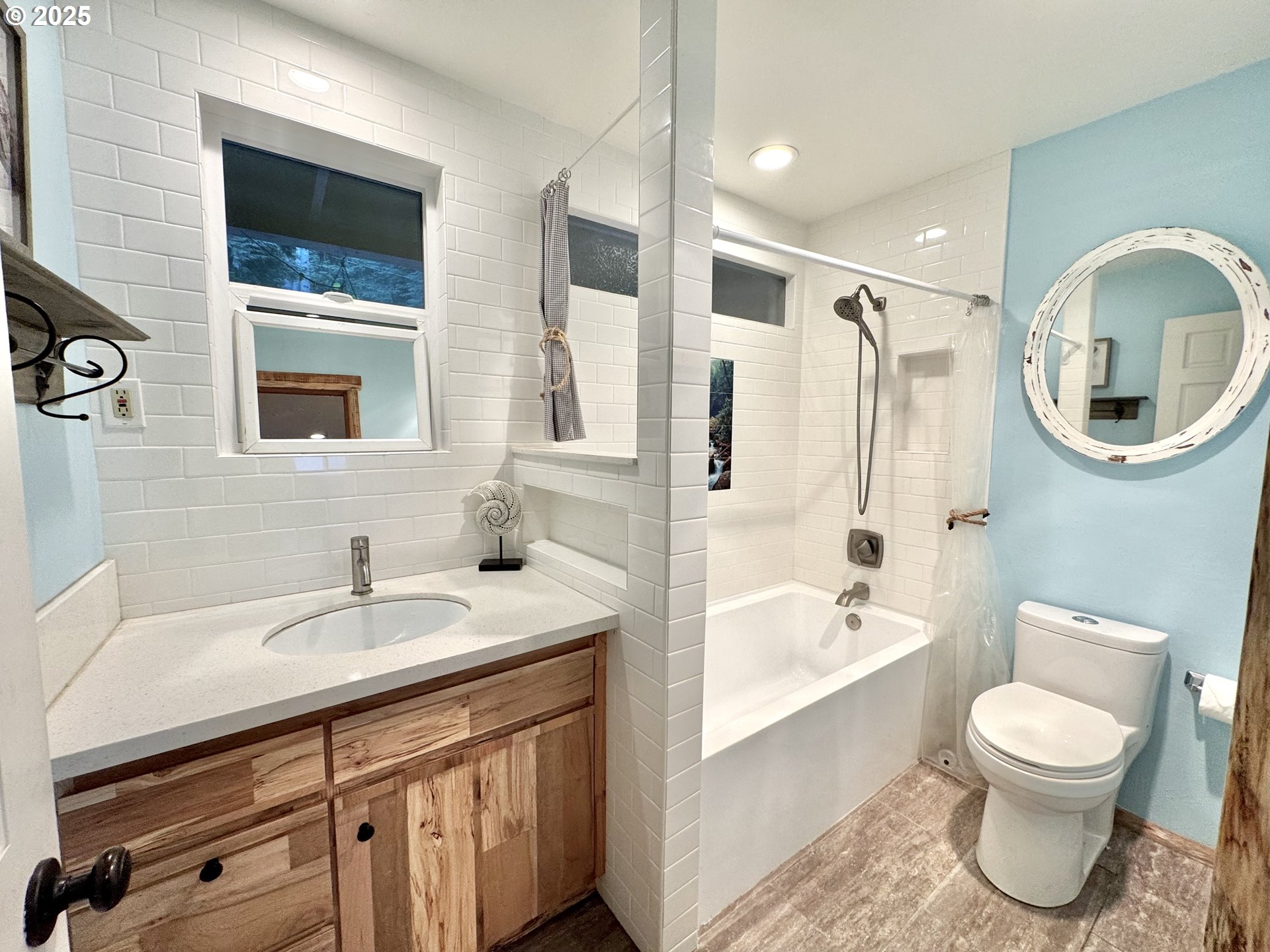 70700 Majestic Shores Road North Bend, OR 97459 - Photo 11 of 48 a bathroom with a sink a toilet and a bathtub