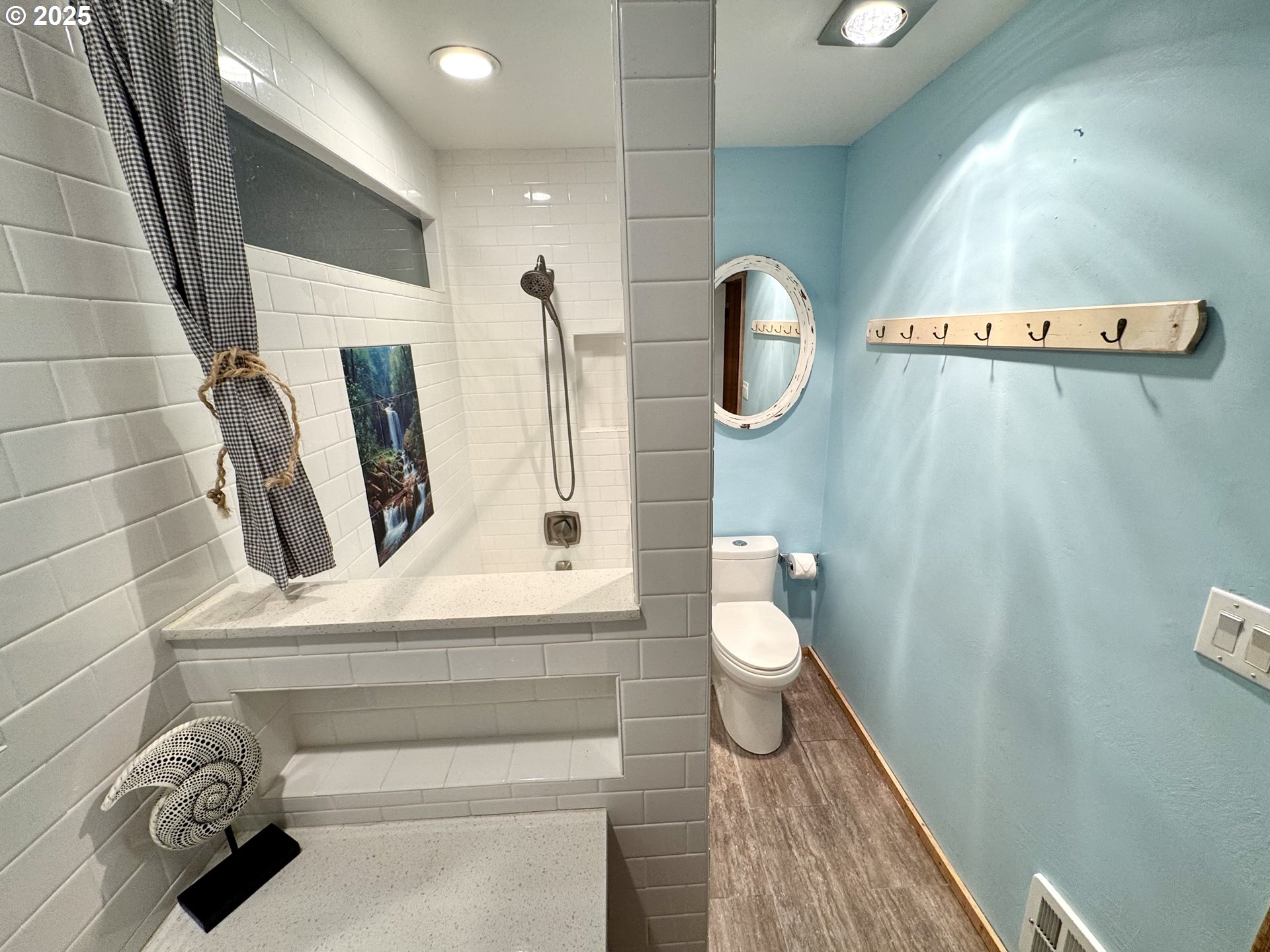 70700 Majestic Shores Road North Bend, OR 97459 - Photo 12 of 48 a bathroom with a sink and mirror