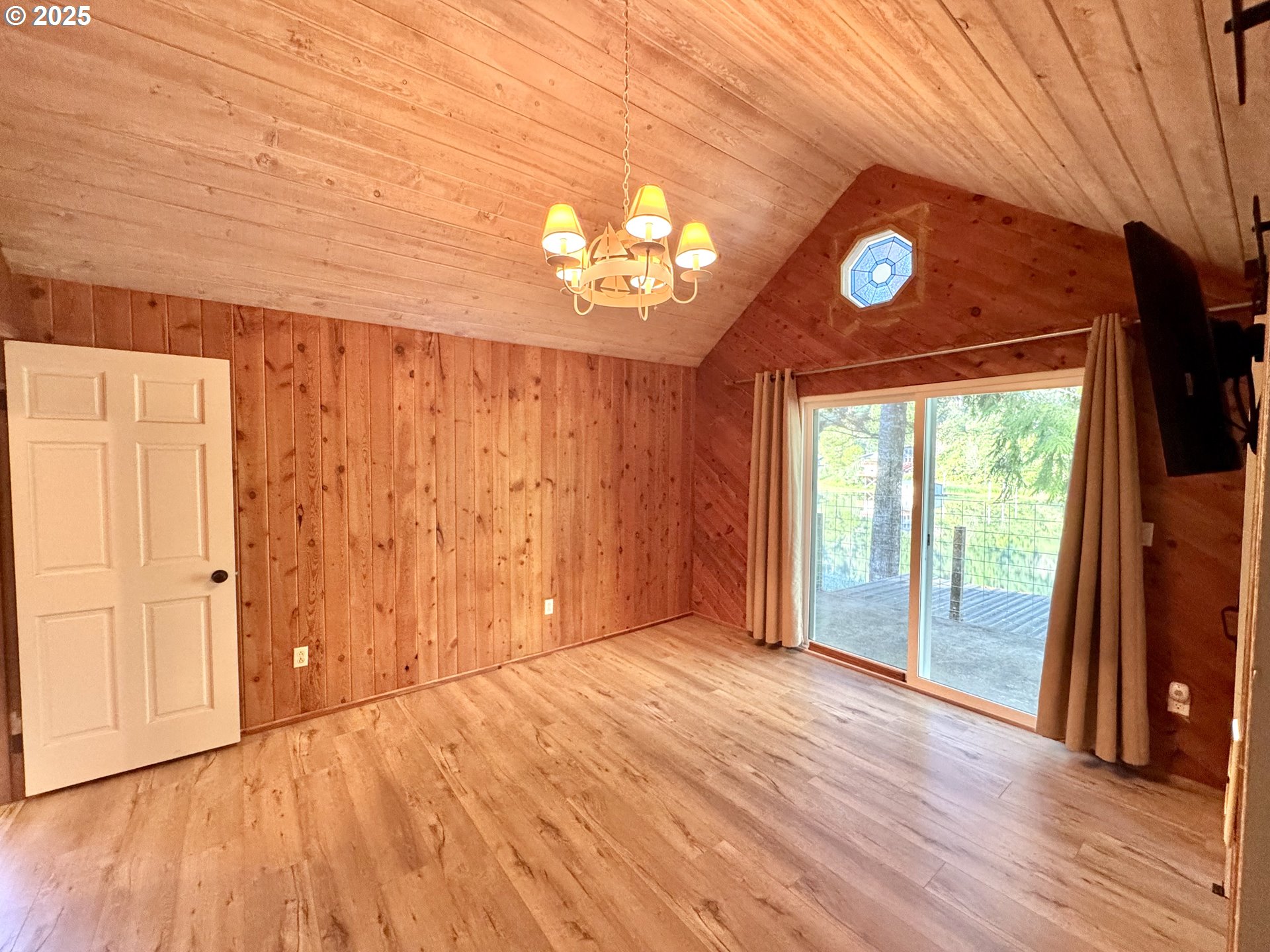 70700 Majestic Shores Road North Bend, OR 97459 - Photo 24 of 48 a view of an empty room with a window