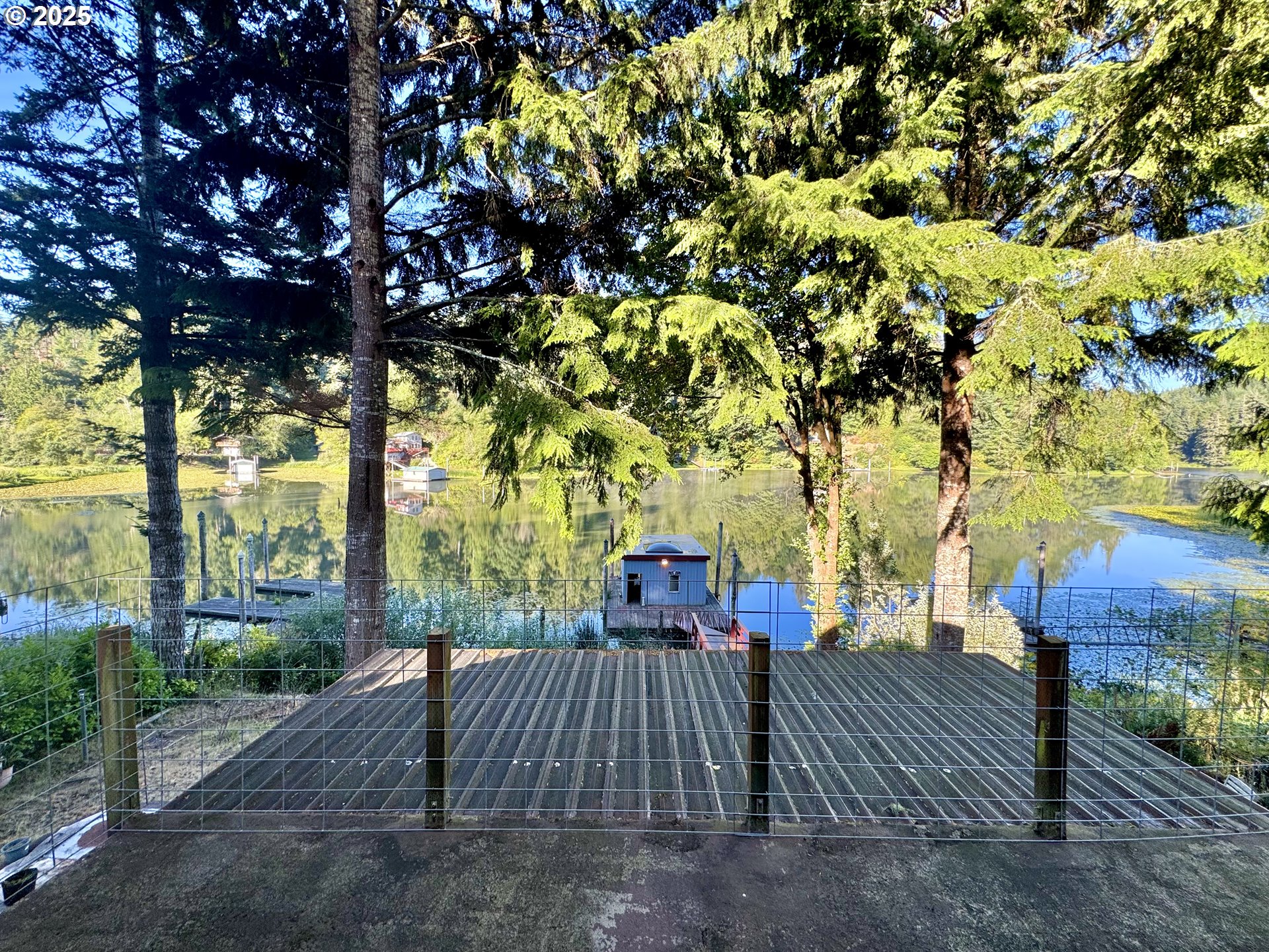 70700 Majestic Shores Road North Bend, OR 97459 - Photo 25 of 48 a view of outdoor space and yard