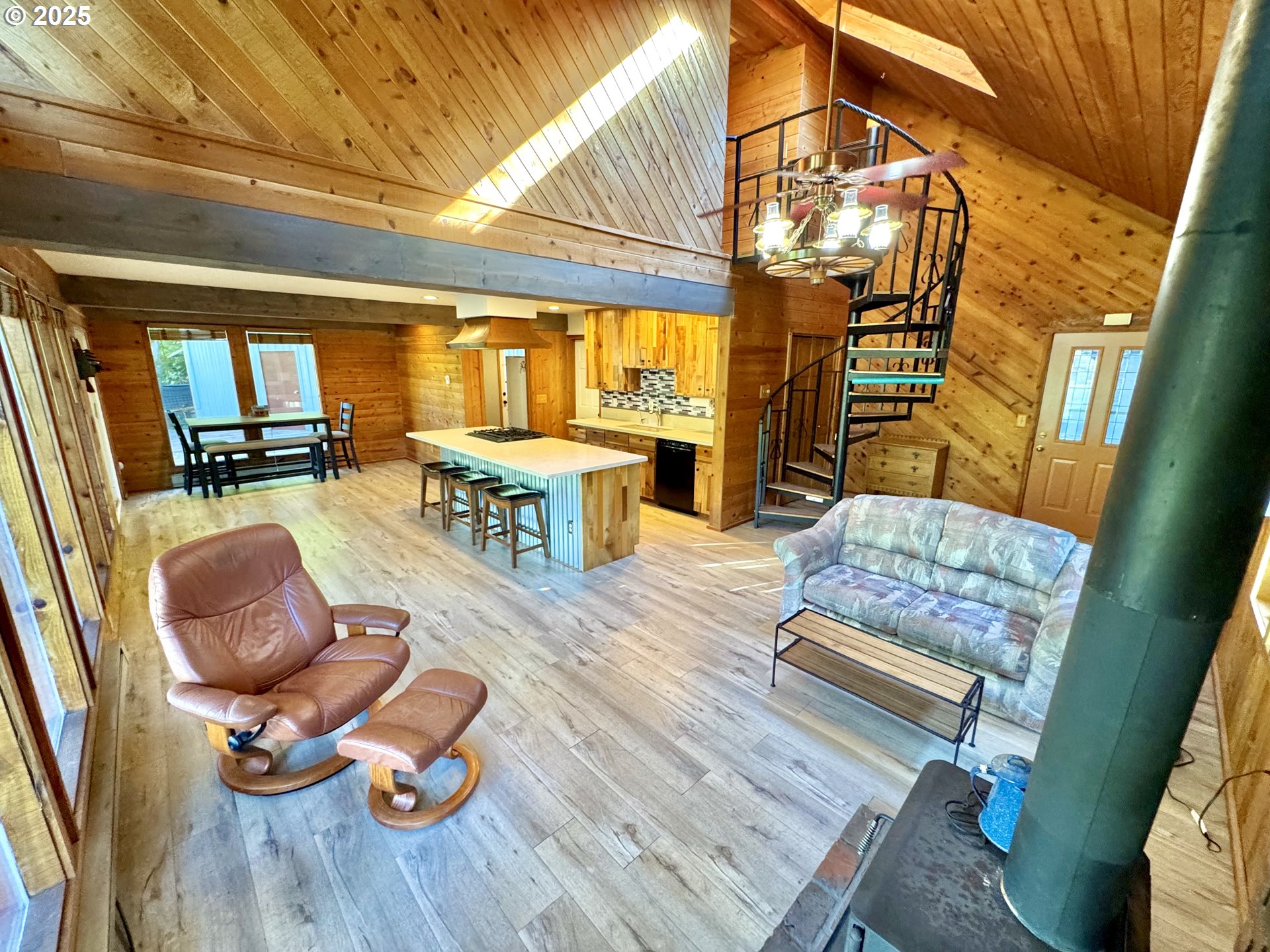 70700 Majestic Shores Road North Bend, OR 97459 - Photo 5 of 48 a living room with furniture and a couch