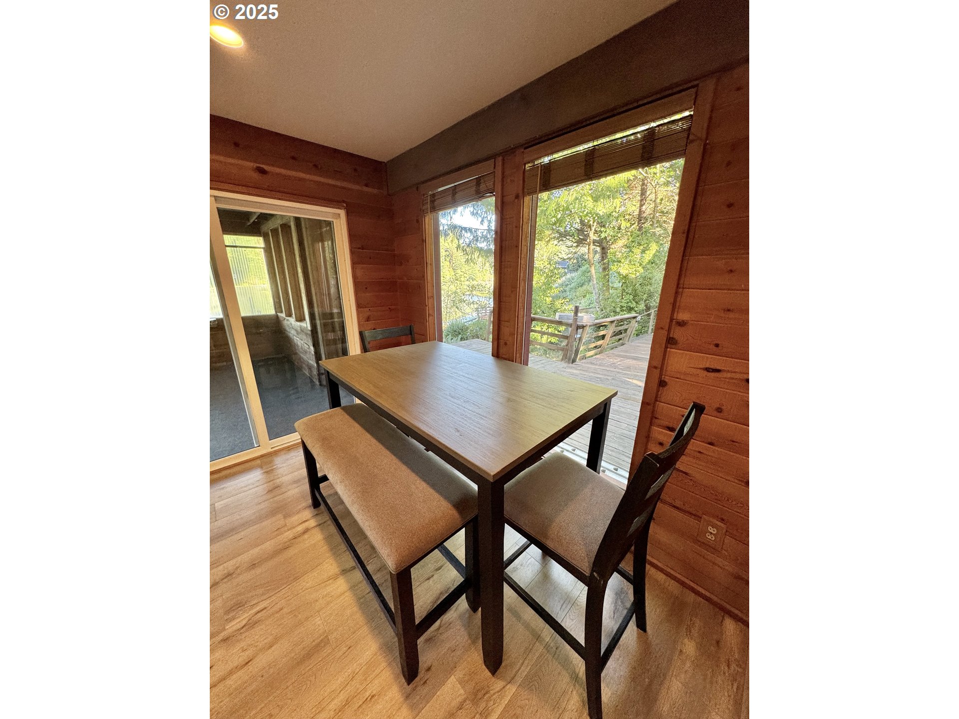 70700 Majestic Shores Road North Bend, OR 97459 - Photo 9 of 48 a view of a dining room with furniture and window
