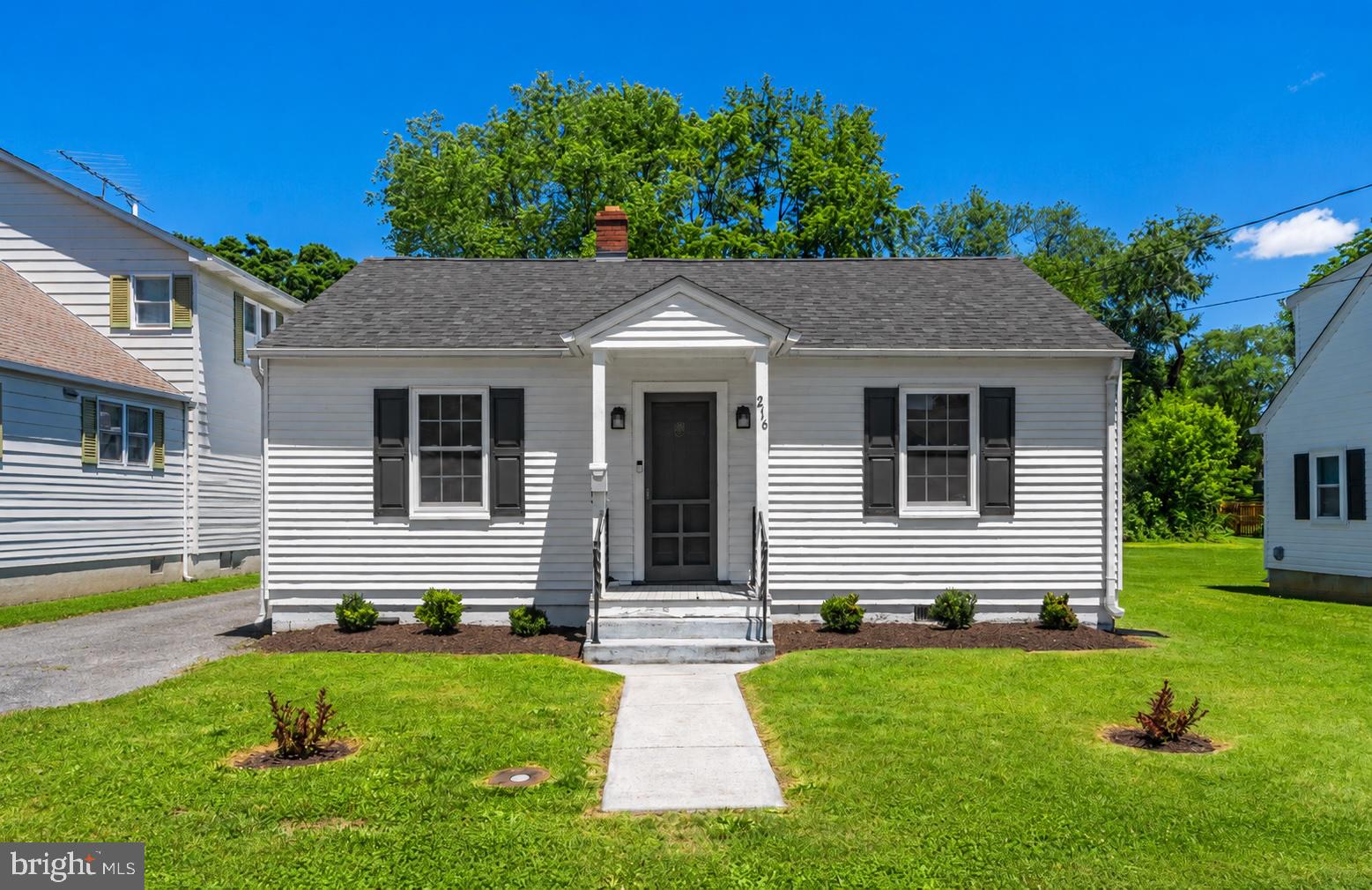 216 Walnut Street Berryville, VA 22611 - Photo 1 of 36 a front view of house with yard and green space