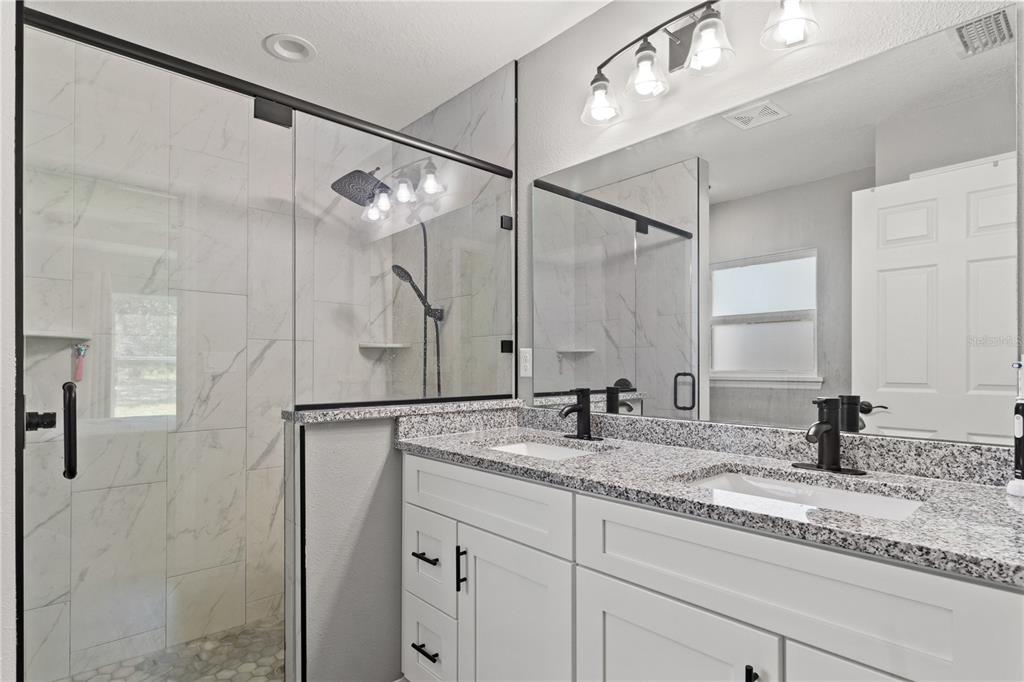 2545 Soundview Drive Dunnellon, FL 34431 - Photo 13 of 23 a bathroom with a sink and a mirror