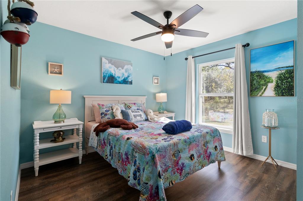 2545 Soundview Drive Dunnellon, FL 34431 - Photo 15 of 23 a bedroom with bed and a window