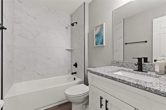 a workspace with furniture and a window