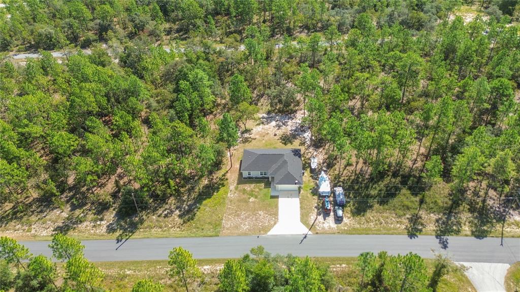 2545 Soundview Drive Dunnellon, FL 34431 - Photo 23 of 23 a view of a house with a yard