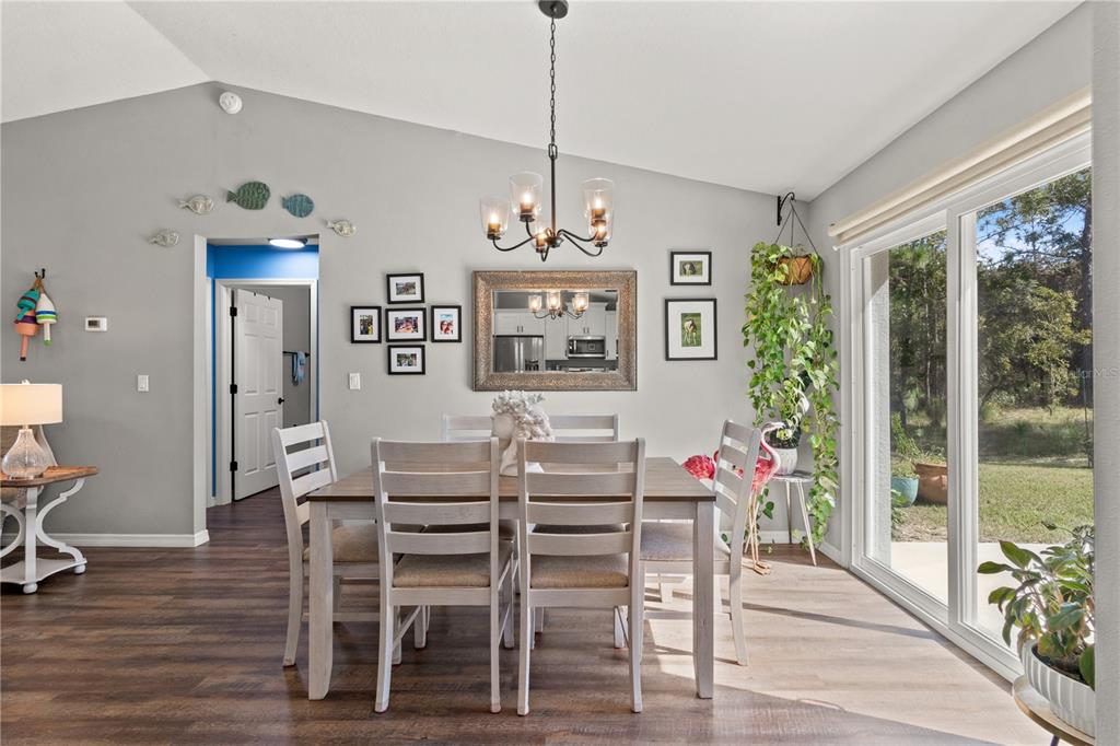 2545 Soundview Drive Dunnellon, FL 34431 - Photo 6 of 23 a view of a dining room with furniture window and wooden floor