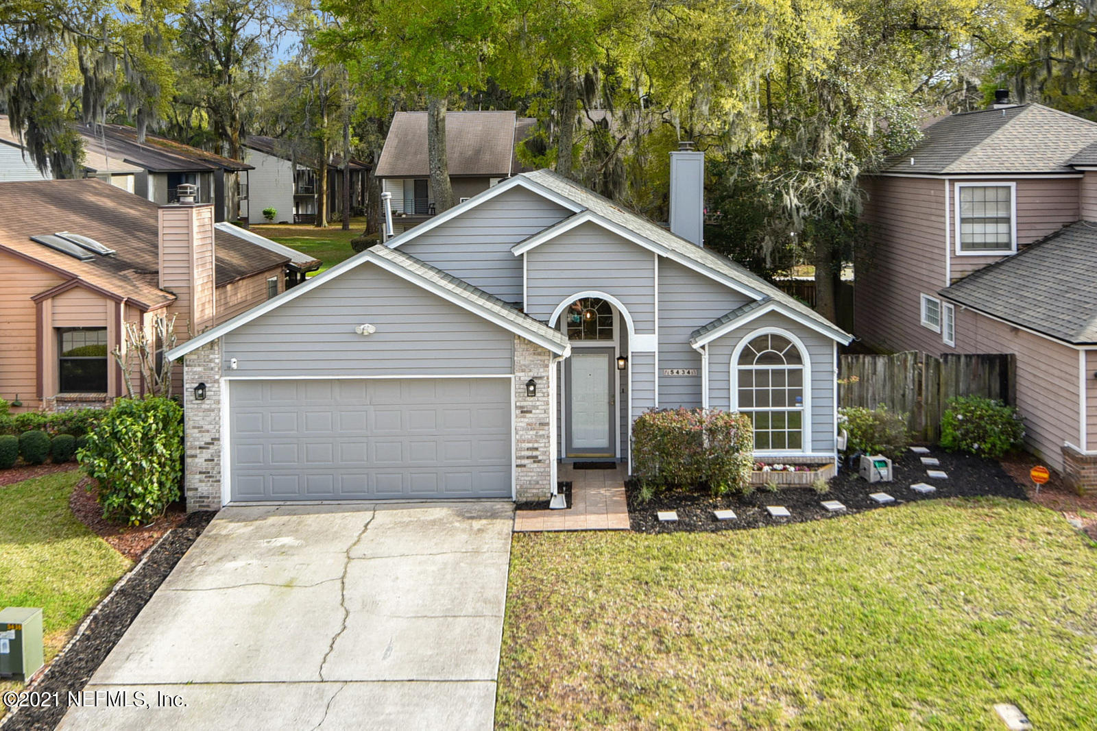 5434 Fort Caroline Road Jacksonville, FL 32277 - Photo 3 of 26 a view of a house with a yard