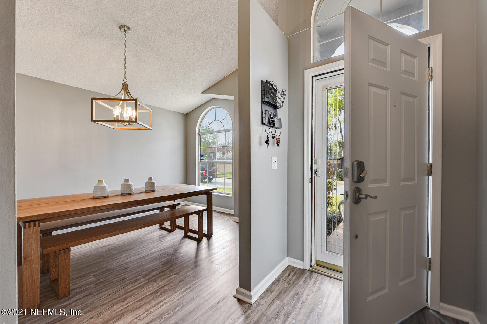 5434 Fort Caroline Road Jacksonville, FL 32277 - Photo 5 of 26 a view of a room with furniture and wooden floor