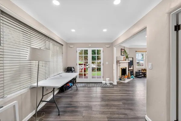 a kitchen with a sink a stove and cabinets