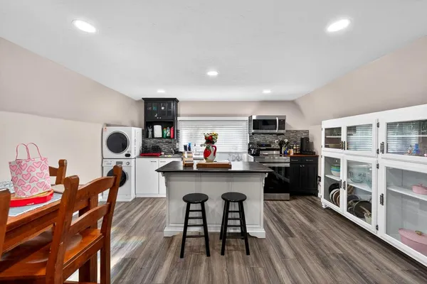 a living room with furniture and a table