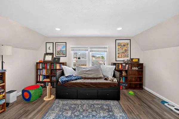 a view of a room with wooden floor and closet