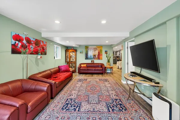 a kitchen with stainless steel appliances a refrigerator sink and cabinets