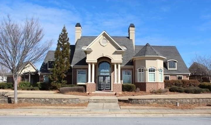 743 Crestwell Circle Atlanta, GA 30331 - Photo 17 of 20 a front view of a house with a yard