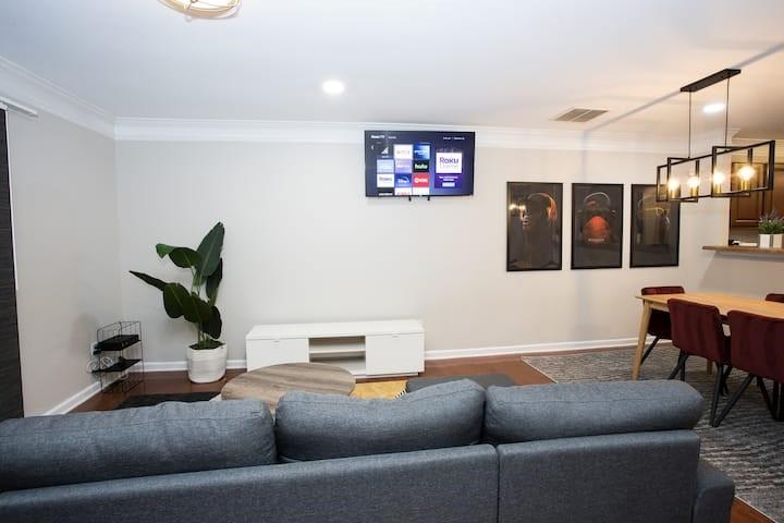 743 Crestwell Circle Atlanta, GA 30331 - Photo 4 of 20 a living room with furniture and a flat screen tv