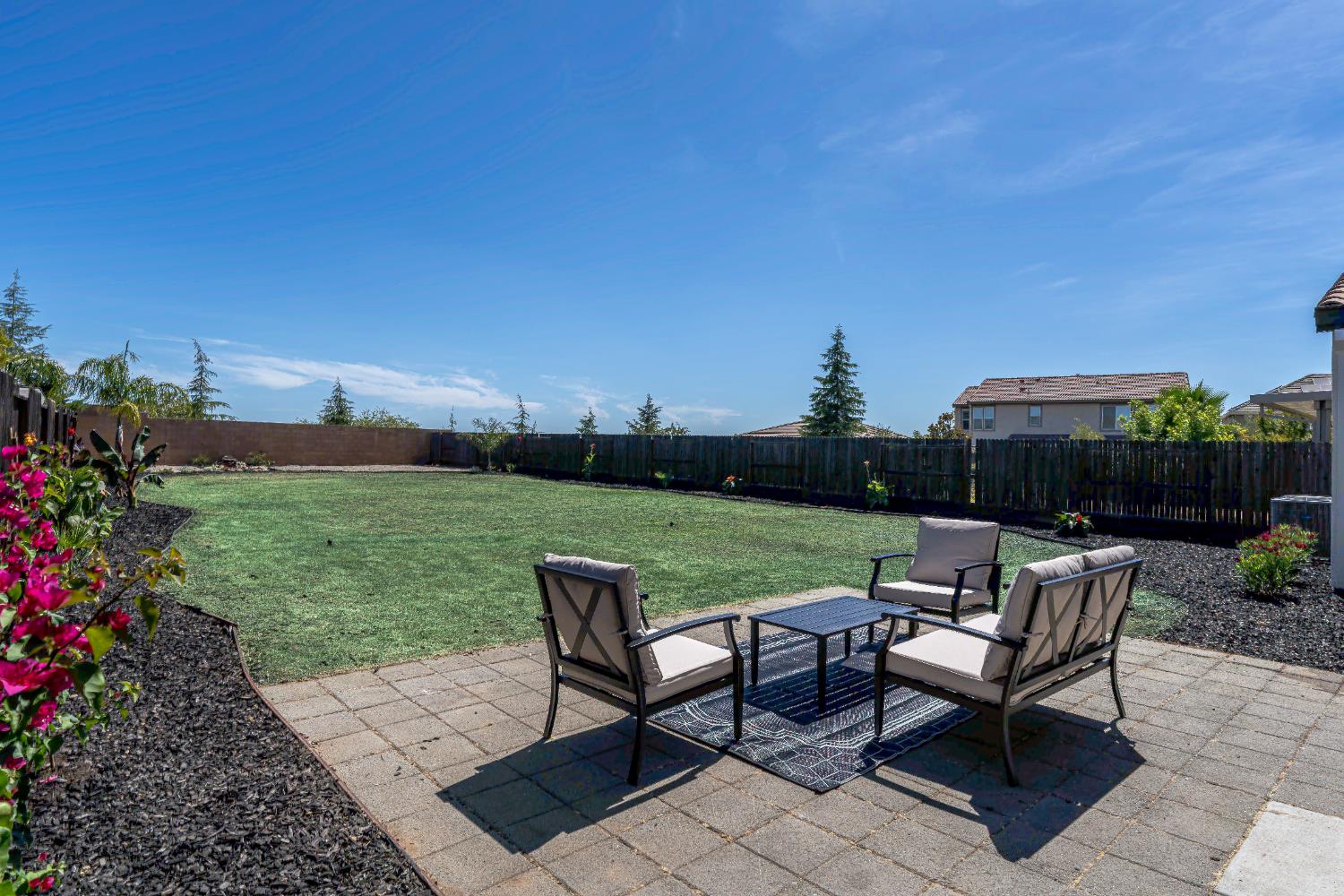 1722 Timbrel Way Rocklin, CA 95765 - Photo 1 of 1 a view of a chairs and table in backyard