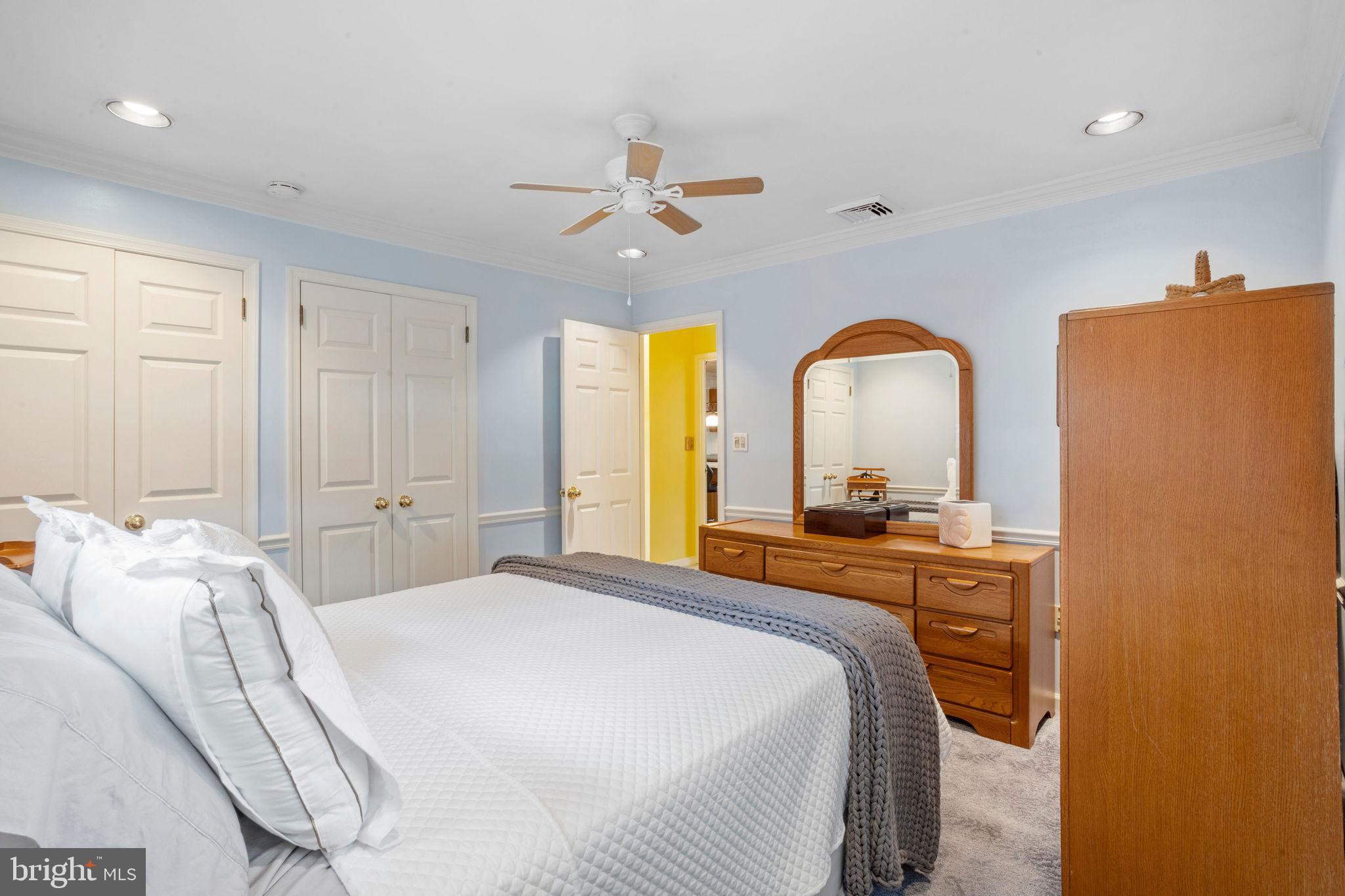 74 Gaping Rock Road Levittown, PA 19057 - Photo 14 of 31 a bedroom with 2 bed and a chandelier