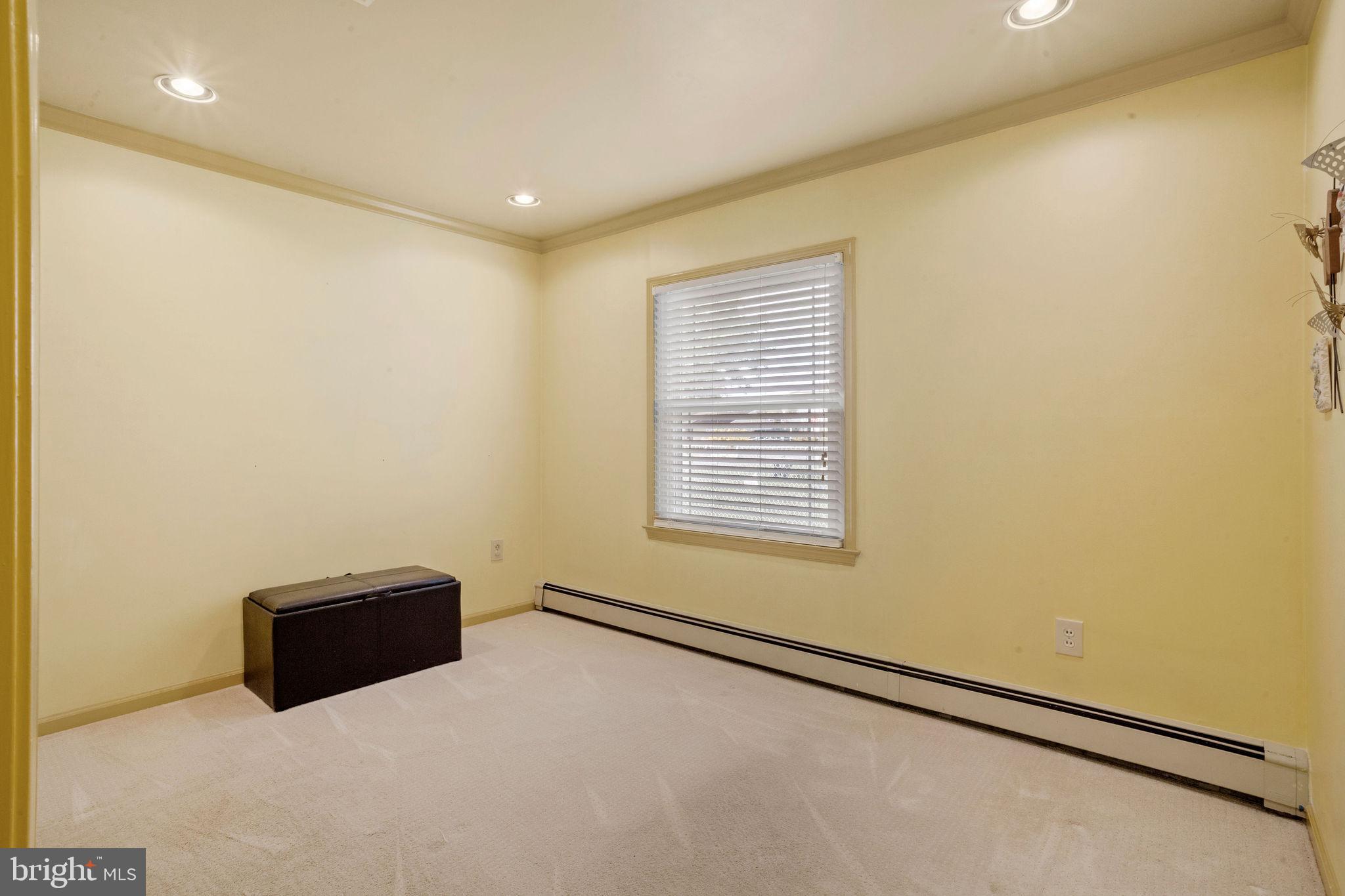 74 Gaping Rock Road Levittown, PA 19057 - Photo 18 of 31 a view of an empty room with a window
