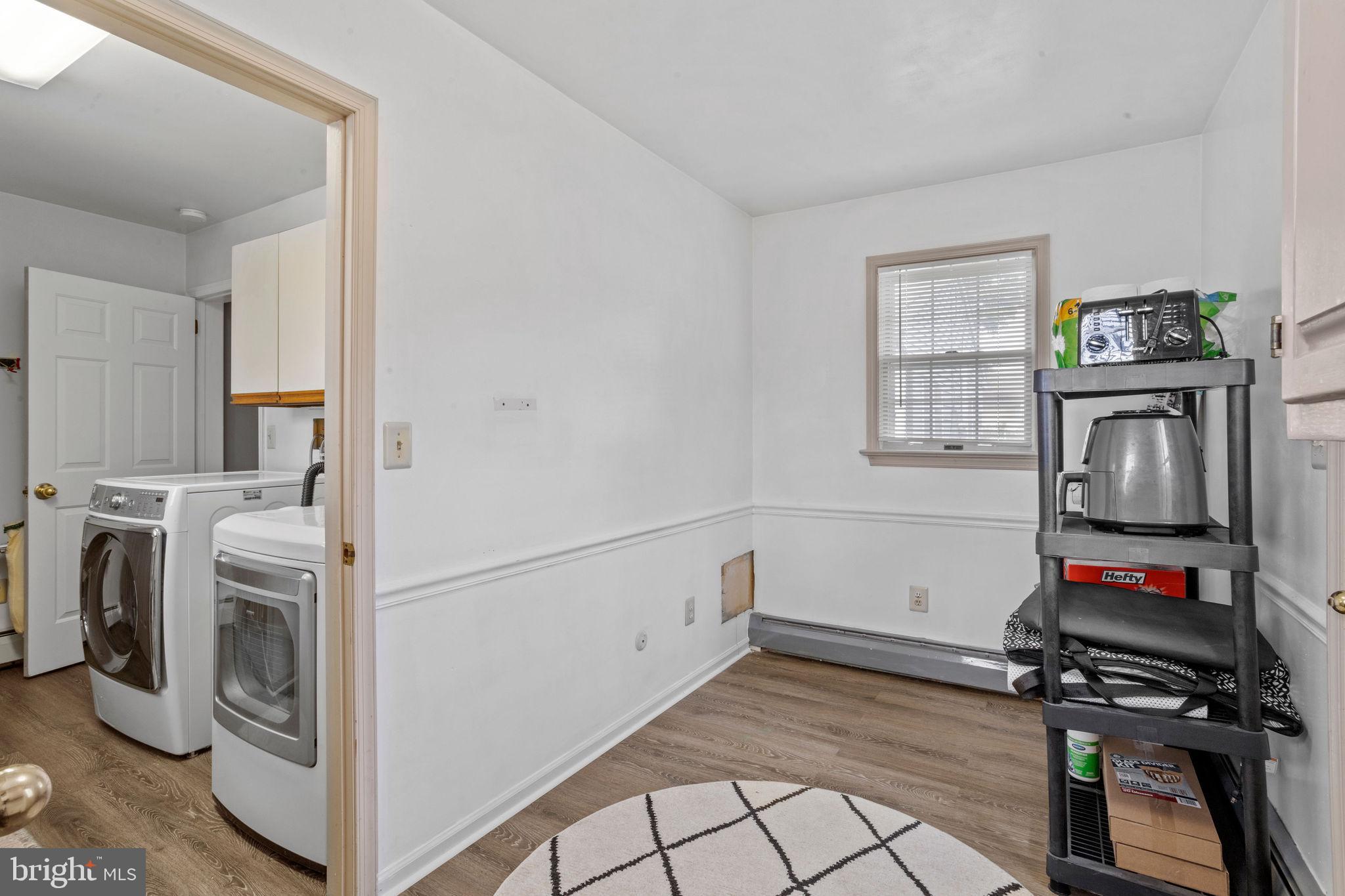 74 Gaping Rock Road Levittown, PA 19057 - Photo 22 of 31 a view of storage and utility room with washer and dryer