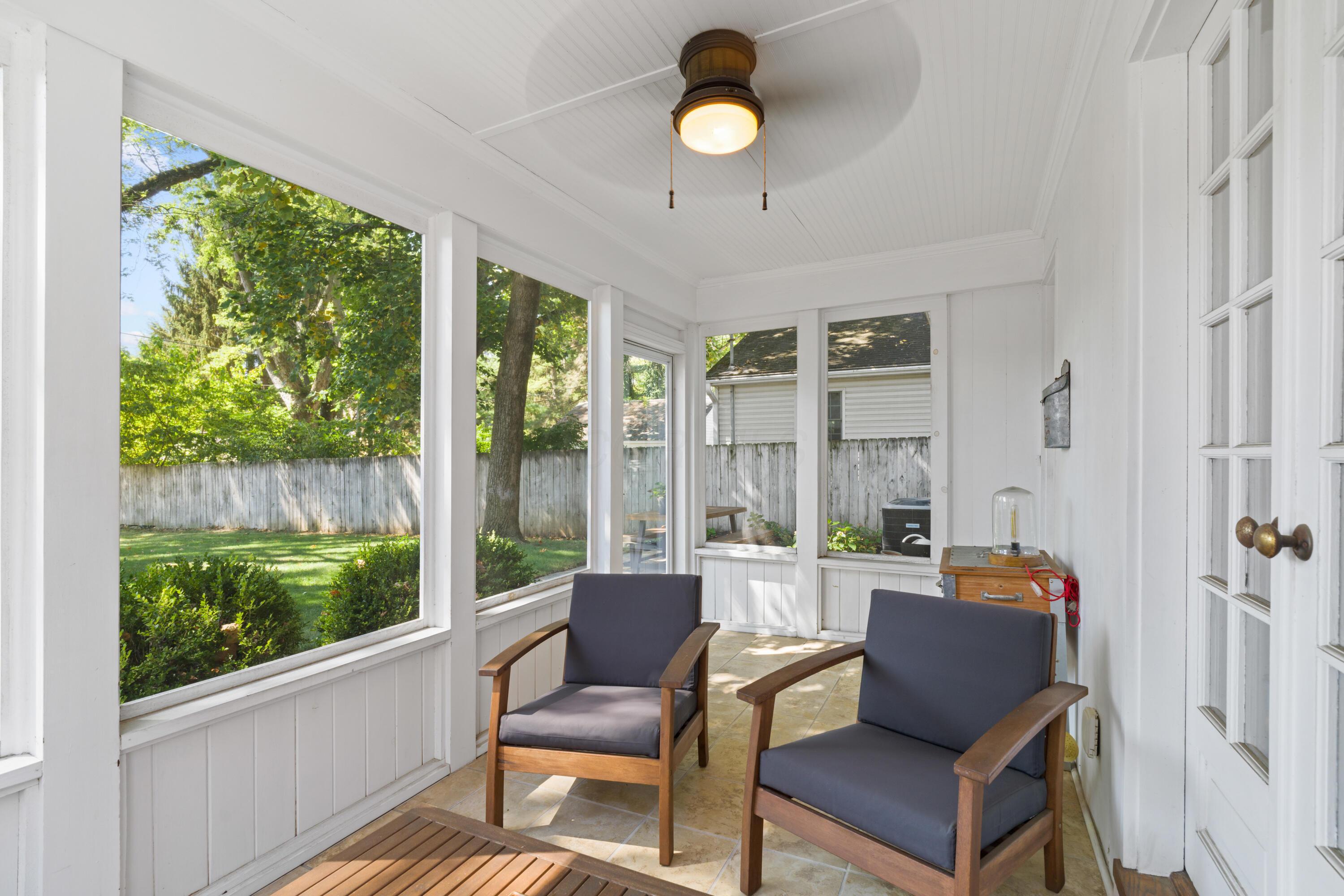 41 Aldrich Road Columbus, OH 43214 - Photo 42 of 52 Screened-in porch overlooks the large fenced backyard!