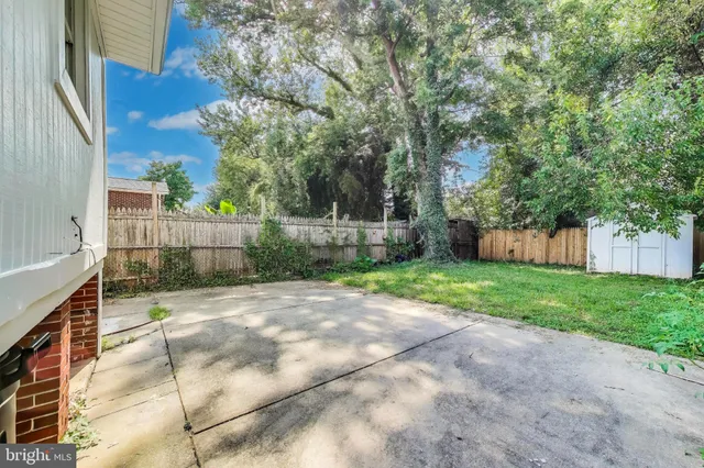 a view of backyard with green space