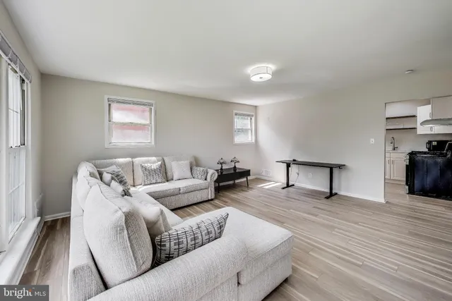 a living room with furniture and a couch