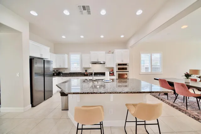 a view of storage and utility room with washer and dryer