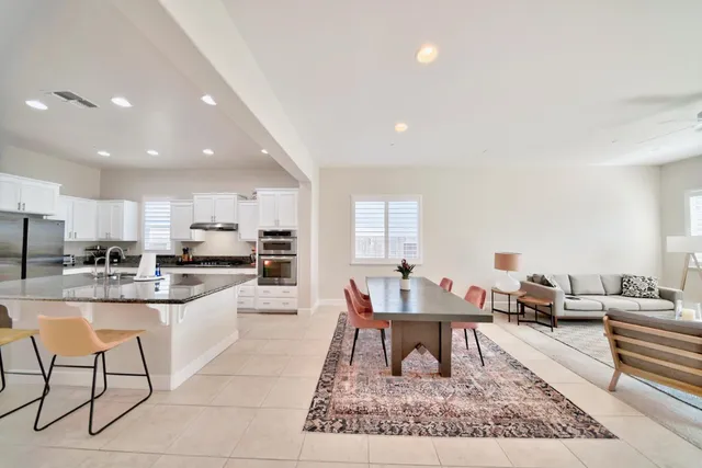 a view of a workspace with furniture