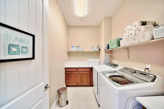 a bathroom with a sink double vanity and a mirror