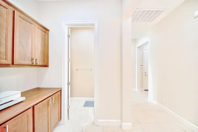 a en suite bathroom with a double vanity sink