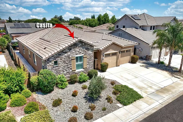 a view of a hallway with wooden shelves