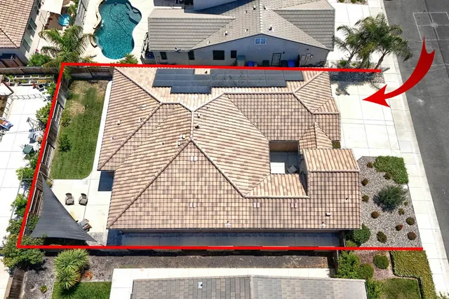 a kitchen with granite countertop a sink and cabinets