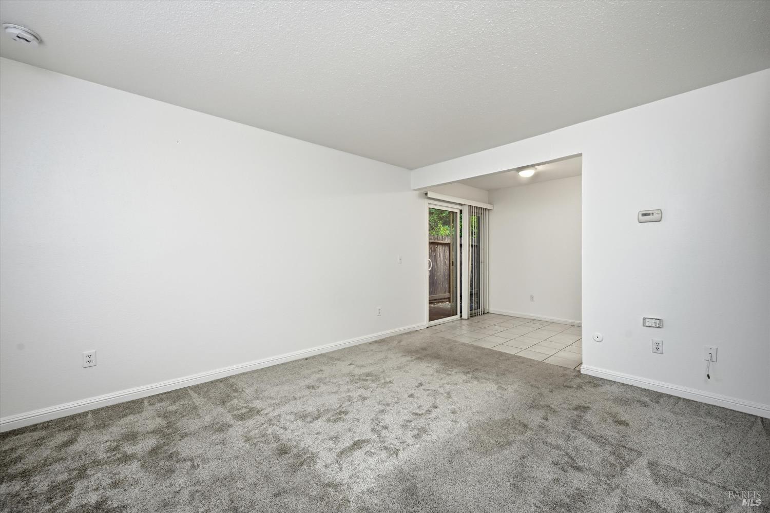 1213 Fair Oaks Avenue Santa Rosa, CA 95404 - Photo 13 of 27 an empty room with an entryway